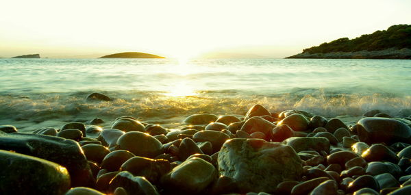 Scenic view of sea against sky during sunset