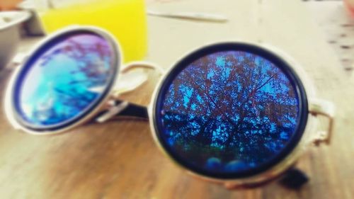 Close-up of sunglasses on table