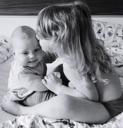 High angle view of mother and daughter at home