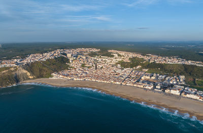 Nazare town in portugal. beach and cityscape. drone point of view.