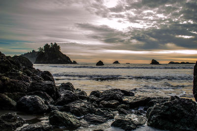 Scenic view of sea against cloudy sky