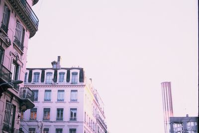Low angle view of buildings against clear sky