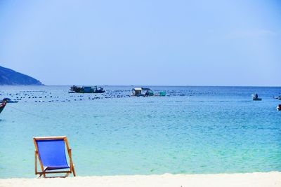Scenic view of beach against clear sky