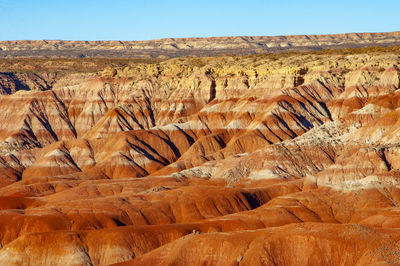 Rock formations in desert against sky