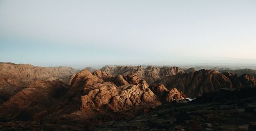 Scenic view of rock formations against sky