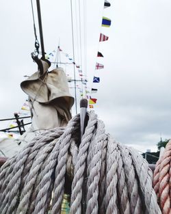 Close-up of rope tied to pole