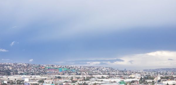 High angle shot of townscape against sky