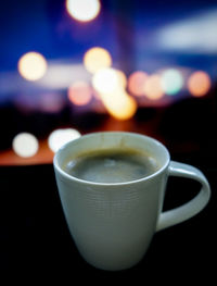 Close-up of coffee cup on table