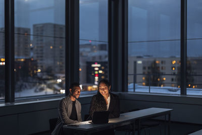 Business people working late in office