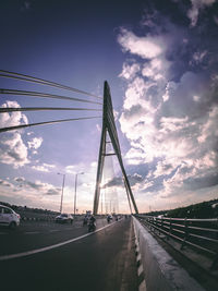 Bridge over road against sky