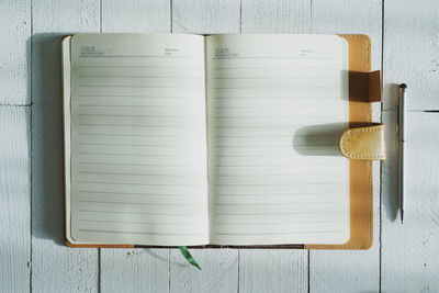 Directly above shot of open book on table