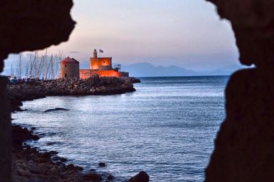 Scenic view of sea at sunset