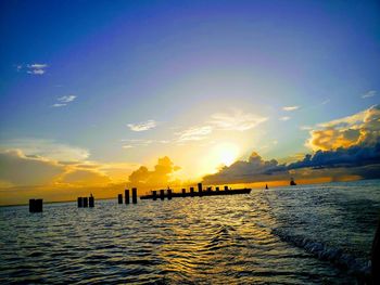 Scenic view of sea against sky during sunset