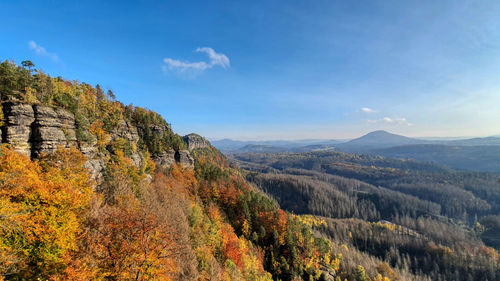 Scenic view of landscape against sky during autumn