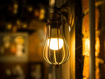 Close-up of illuminated light bulb