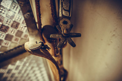 Close-up of rusty metal against wall