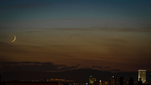 Illuminated cityscape at night