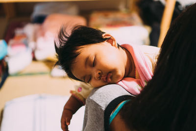 Close-up portrait of woman sleeping