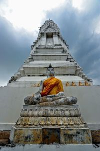 Low angle view of statue against building