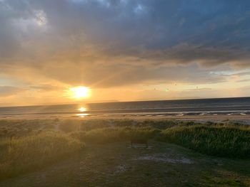 Scenic view of sea against sky during sunset