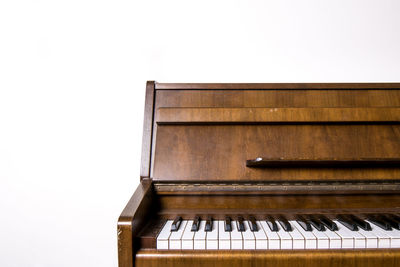 Close-up of piano against clear sky