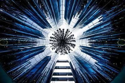 Low angle view of illuminated lighting equipment