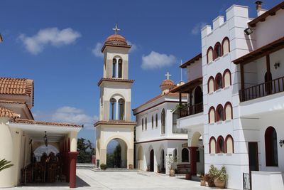 View of buildings in city against sky