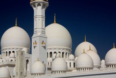 Exterior of sheikh zayed grand mosque against clear blue sky