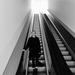 Low angle view of woman on steps
