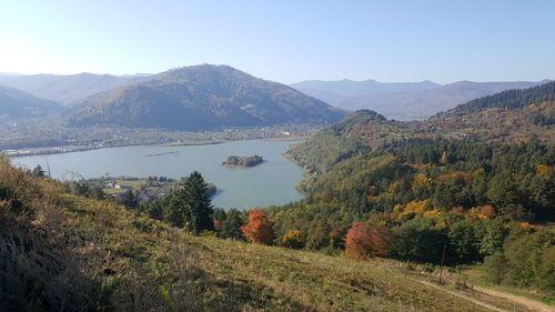 Scenic view of landscape and mountains against sky