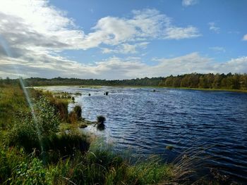 Scenic view of lake against sky