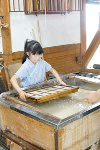 Woman working on table