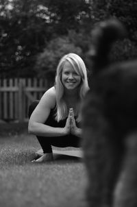 Rear view of woman doing yoga pose