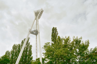 Low angle view of windmill against sky