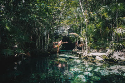 Yoga practice in cenote