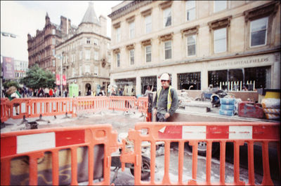 Man standing in front of building