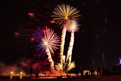 Firework display at night