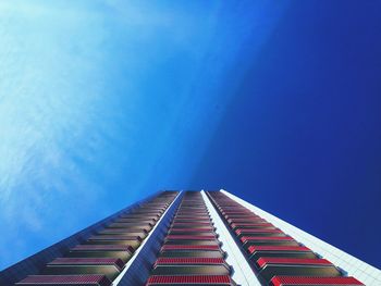 Low angle view of building against blue sky