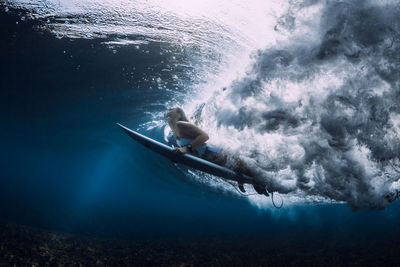 Man surfing in sea