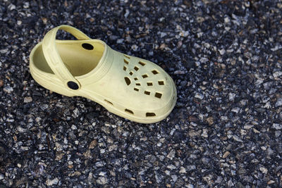 High angle view of shoes on road