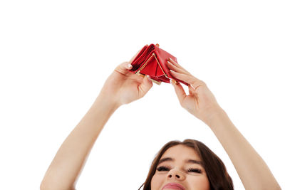 Close-up portrait of a woman hand over white background