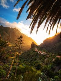 Scenic view of mountains against sky during sunset