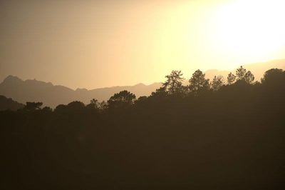 Scenic view of mountains at sunset