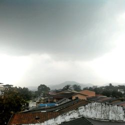 Building against cloudy sky