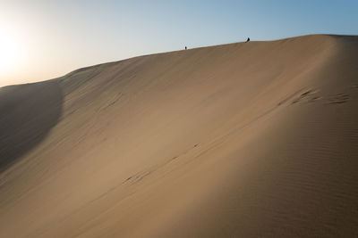 Scenic view of desert against sky