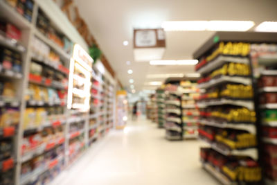 Rear view of woman standing in store
