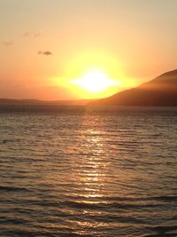 Scenic view of sea at sunset