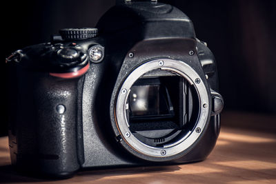 Close-up of camera on table