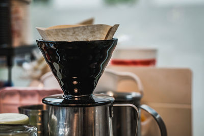 Close-up of coffee cup on table