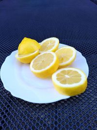 High angle view of fruits in plate on table